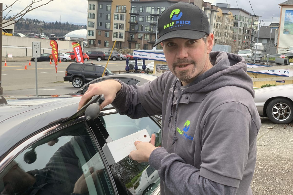 Half Price Unlocks technician unlocking a car door